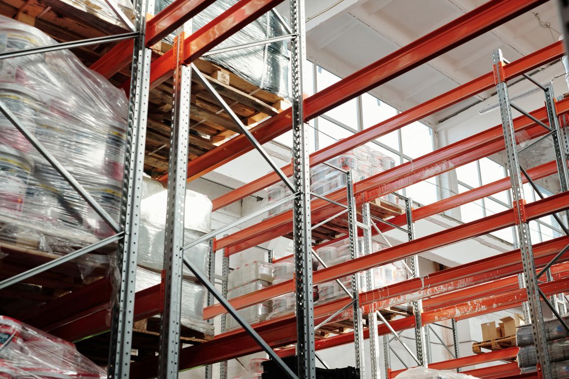 Palletized inventory stored on industrial warehouse racks